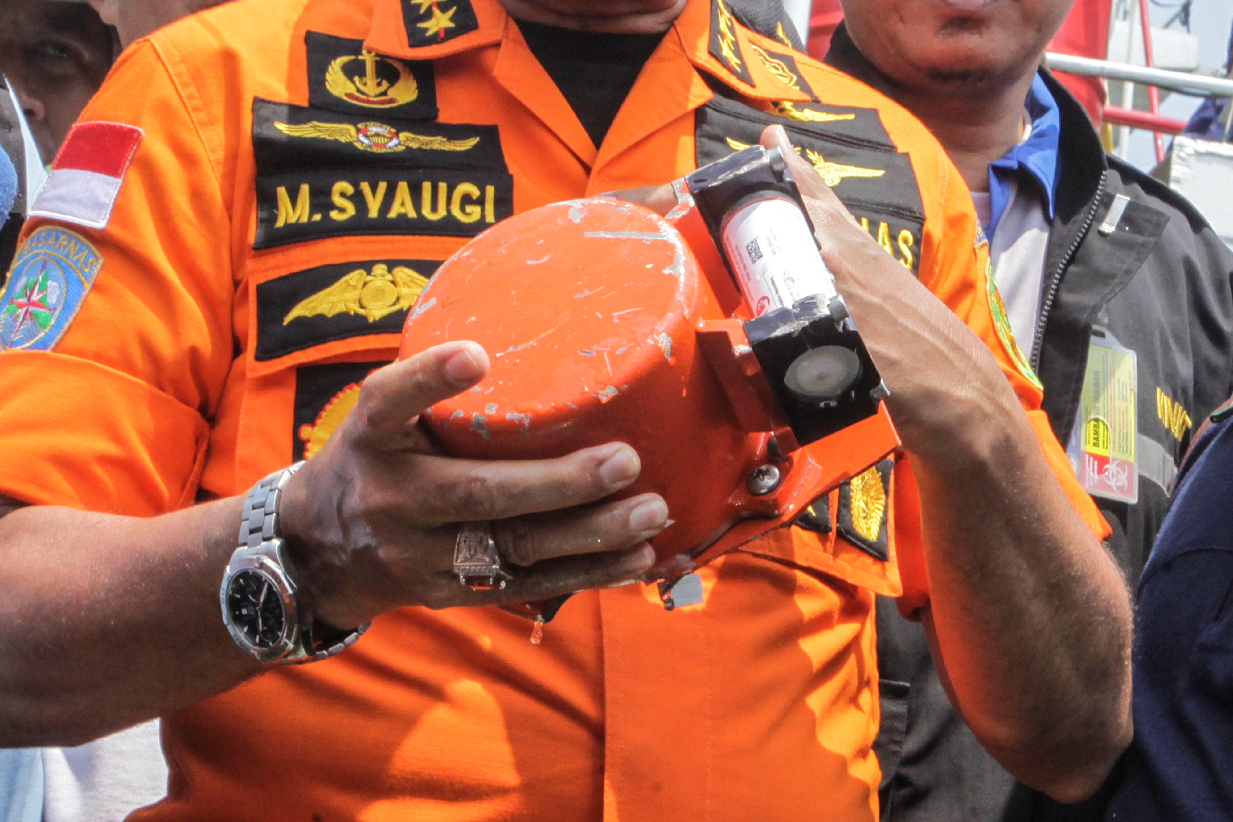 Chief of National Search and Rescue Agency Muhammad Syaugi shows a part of the black box of Lion Air's flight JT610 airplane, on Baruna Jaya ship, in the north sea of Karawang, Indonesia, November 1, 2018. Antara Foto/Muhammad Adimaja via REUTERS