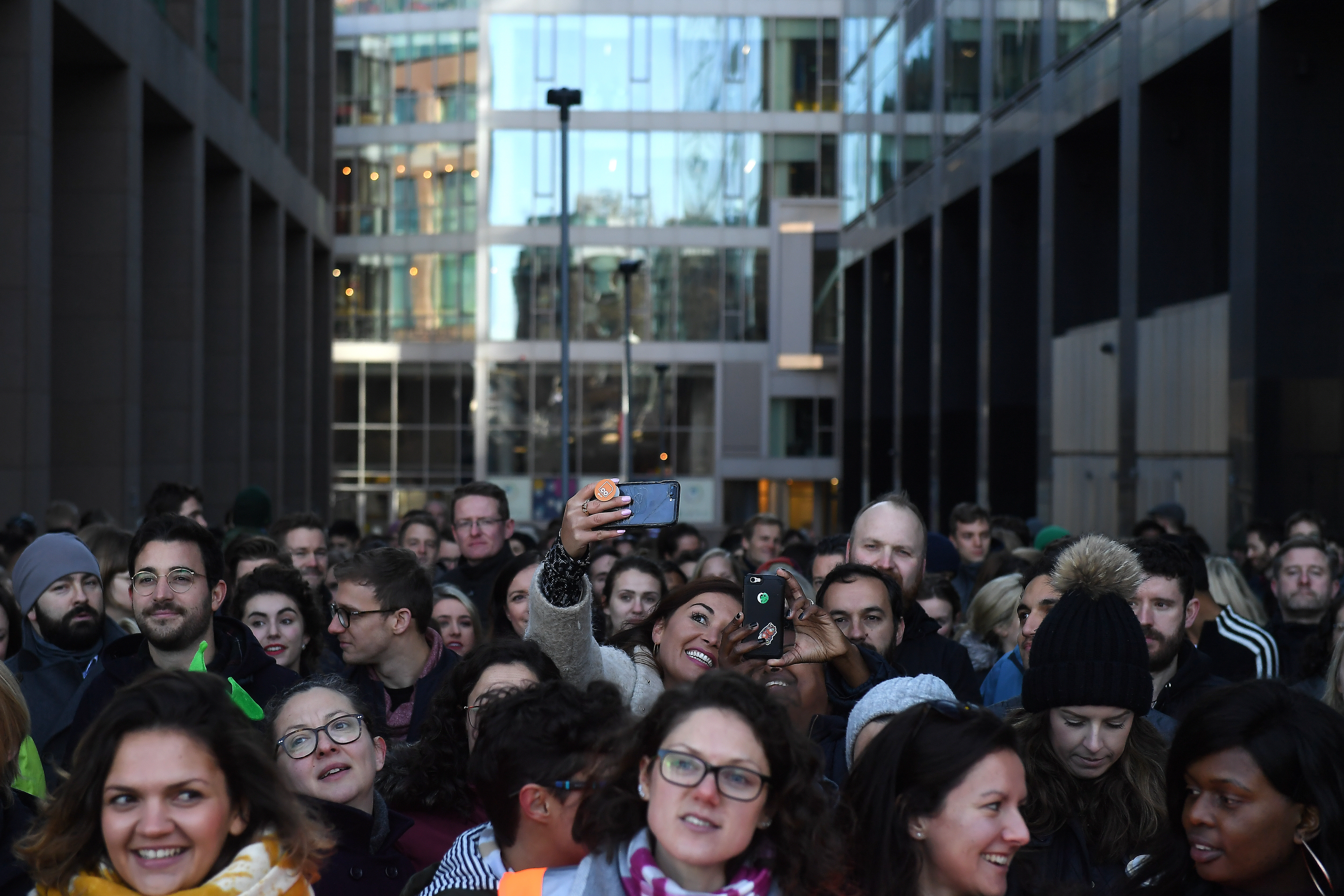 Workers stand outside the Google offices after walking out as part of a global protest over workplace issues in Dublin, Ireland, November 1, 2018. REUTERS/Clodagh Kilcoyne