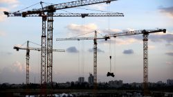 Cranes are seen at a construction site in the new neighbourhood of Carmei Gat in the southern Israeli city of Kiryat Gat November 1, 2016. REUTERS/Amir Cohen/File Photo