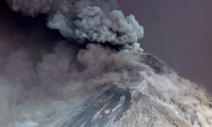 Steam rises from Fuego volcano (Volcano of Fire) as seen from San Juan Alotenango, outside of Guatemala City, Guatemala November 19, 2018. REUTERS/Luis Echeverria
