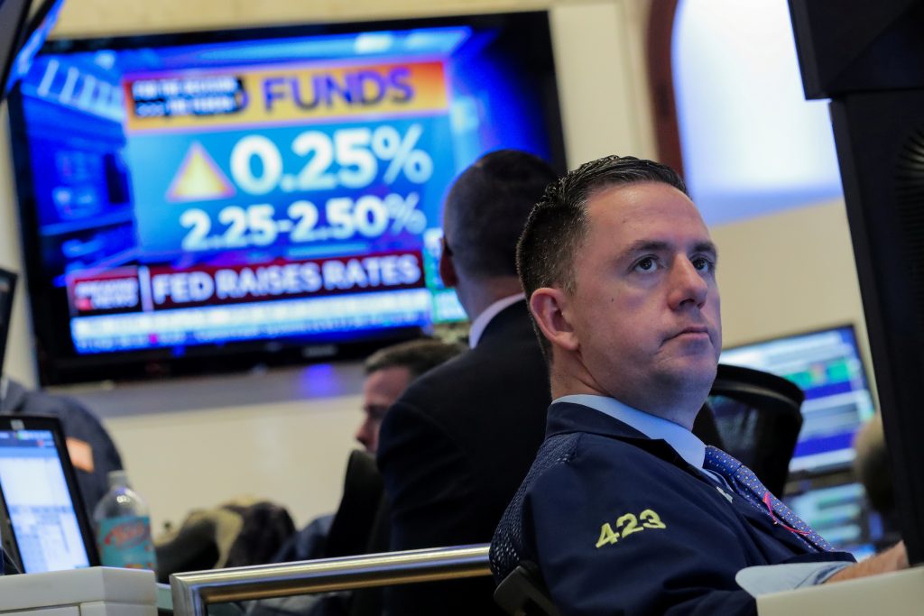 Fed raises interest rates, signals more hikes ahead