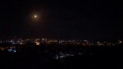 What is believed to be guided missiles are seen in the sky during what is reported to be an attack in Damascus, Syria, January 21, 2019, in this still image taken from a video obtained from social media. Facebook Diary of a Mortar Shell in Damascus/Youmiyat Qadifat Hawun fi Damashq/via REUTERS