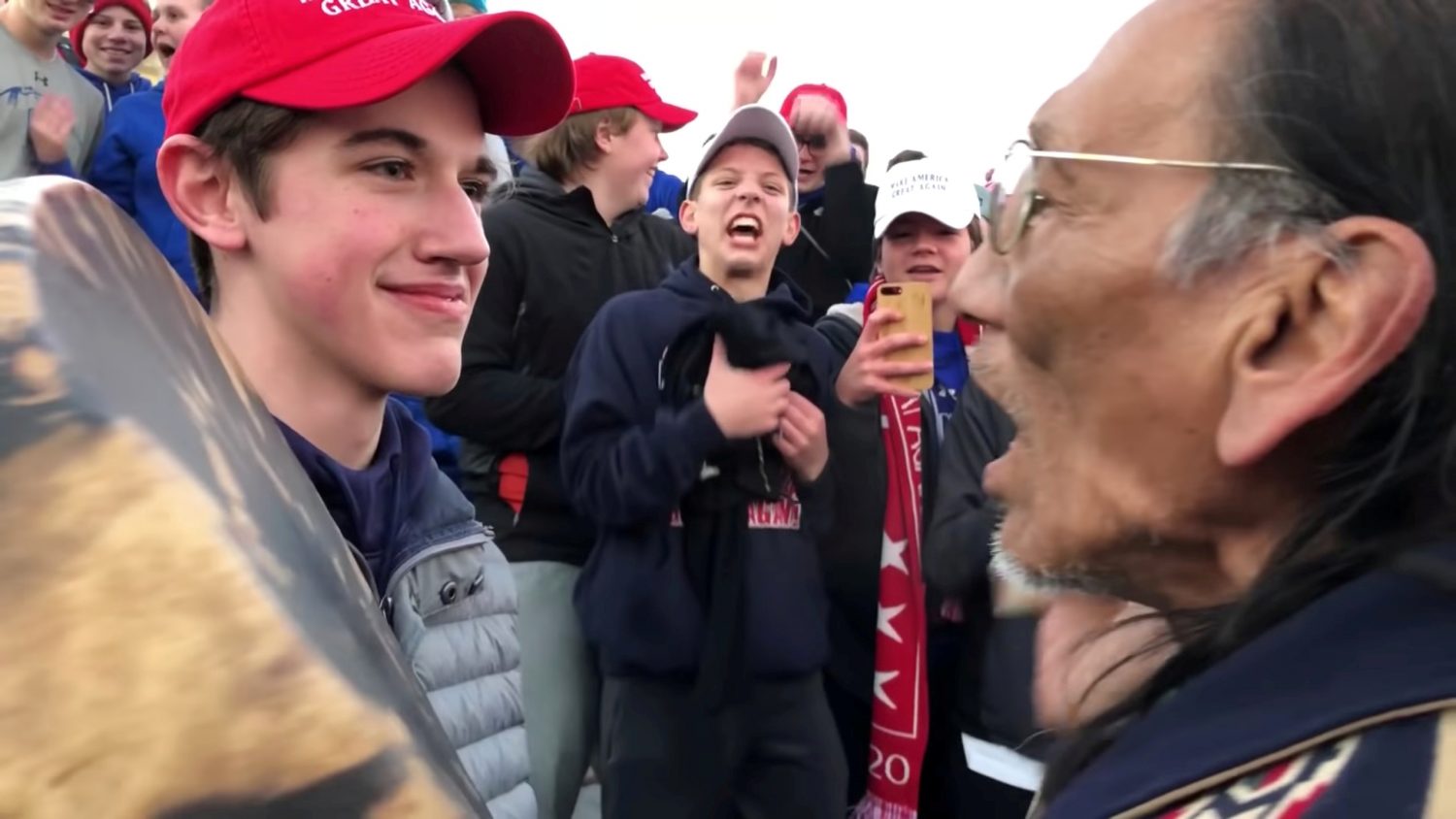 FILE PHOTO: Nicholas Sandmann, 16, a student from Covington Catholic High School stands in front of Native American activist Nathan Phillips in Washington, U.S., in this still image from a January 18, 2019 video by Kaya Taitano. Kaya Taitano/Social Media/via REUTERS/File Photo