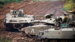 Israeli soldiers are seen on top of an armoured personnel carrier (APC) near the border between Israel and Gaza on its Israeli side, March 15, 2019. REUTERS/Amir Cohen