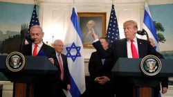 U.S. President Donald Trump gestures next to Israel's Prime Minister Benjamin Netanyahu during a ceremony to sign a proclamation recognizing Israel's sovereignty over the Golan Heights in the Diplomatic Reception Room at the White House in Washington, U.S., March 25, 2019. REUTERS/Carlos Barria