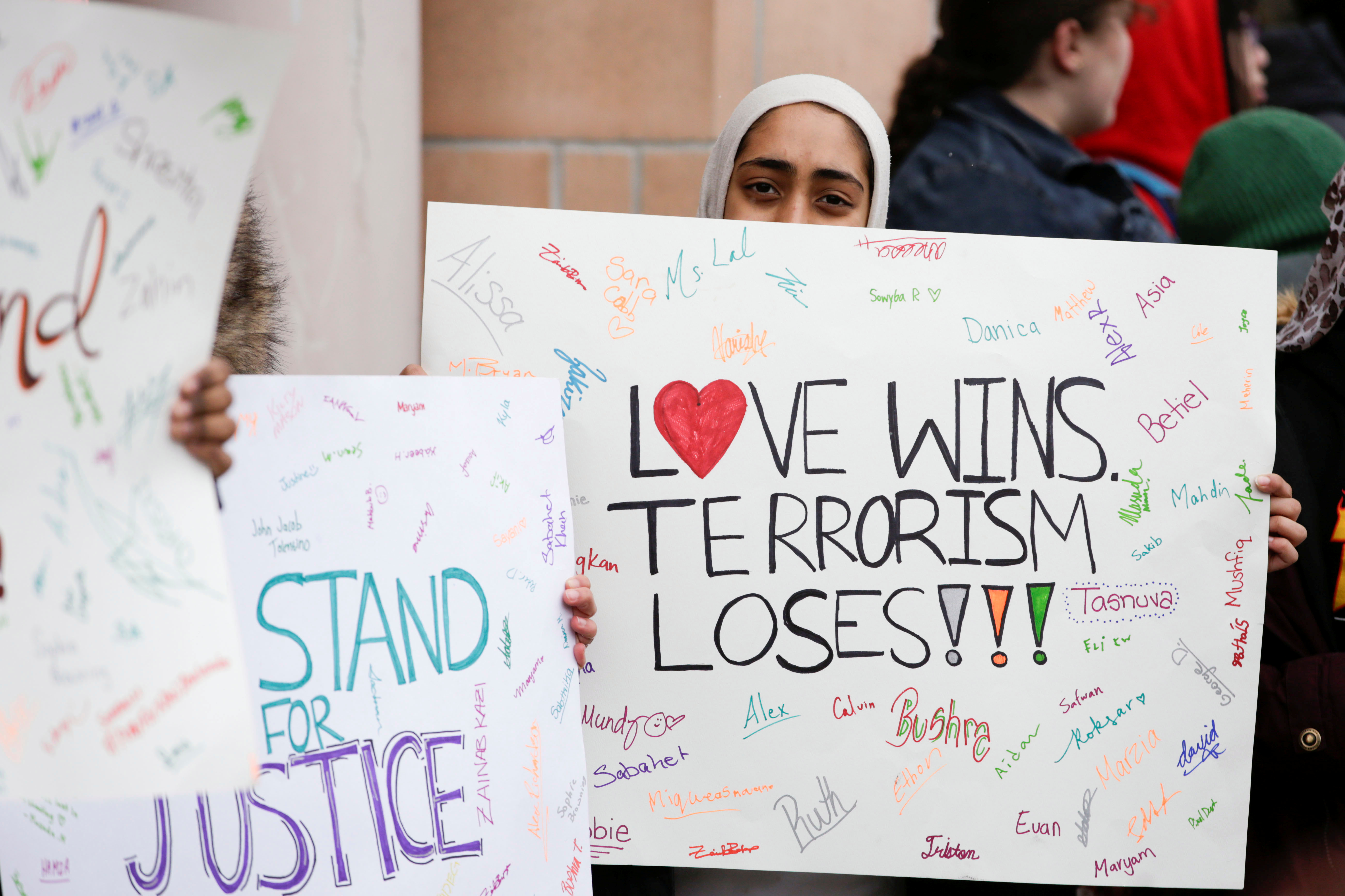 FILE PHOTO - People gather to form a "ring of peace" around a local mosque to show solidarity with the victims of the Christchurch mosque attacks in New Zealand, in Toronto, Ontario, Canada, March 22, 2019. REUTERS/Carlos Osorio