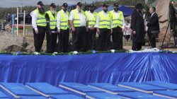 People attend a ceremony to rebury the remains of Jews killed by Nazis in a local ghetto during World War Two, which were recently found at a construction site in a residential area, in the city of Brest, Belarus May 22, 2019. REUTERS/Stringer