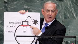 FILE PHOTO: Israel's Prime Minister Benjamin Netanyahu points to a red line he has drawn on the graphic of a bomb as he addresses the 67th United Nations General Assembly at the U.N. Headquarters in New York, U.S., September 27, 2012. REUTERS/Lucas Jackson/File Photo