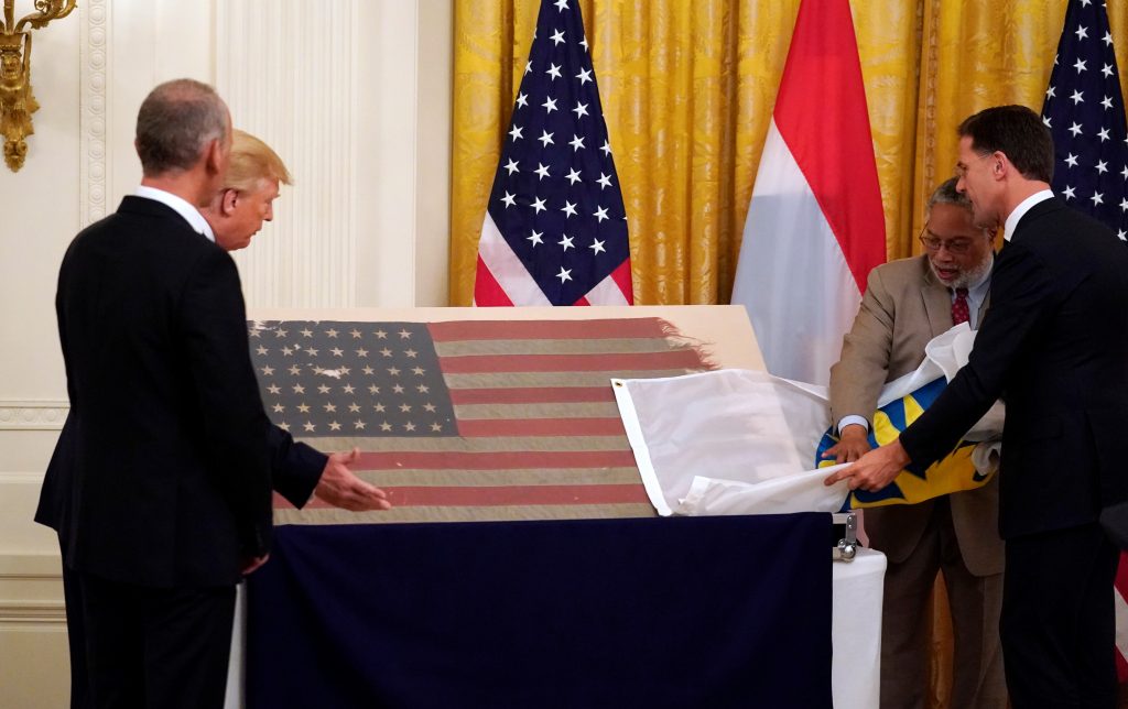 Bullet-riddled U.S. flag that survived D-Day comes home 75 years later