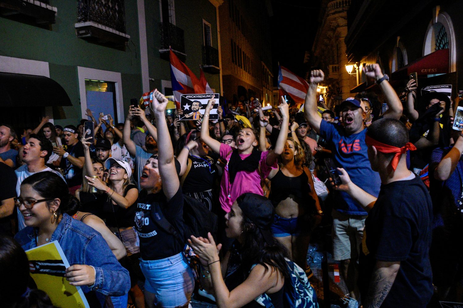 Demonstrators celebrate after the resignation of Puerto Rico Governor Ricardo Rossello in San Juan, Puerto Rico, July 24, 2019. REUTERS/Gabriella N. Baez