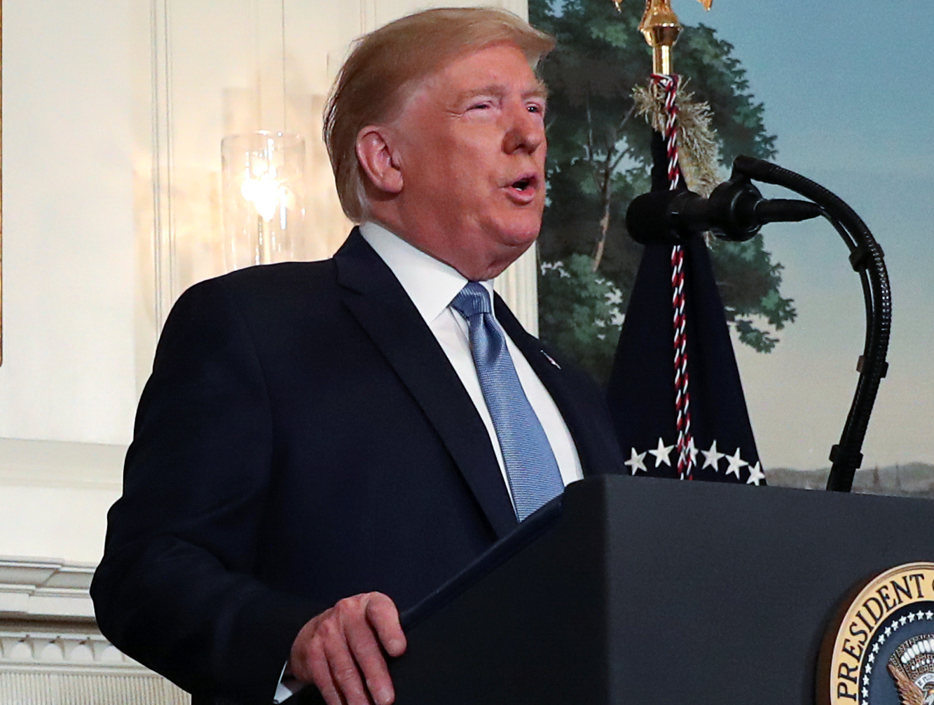 U.S. President Donald Trump speaks about the shootings in El Paso and Daytonin the Diplomatic Room of the White House in Washington, U.S., August 5, 2019. REUTERS/Leah Millis