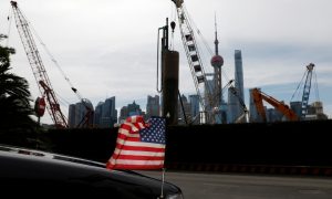 FILE PHOTO: A U.S. flag on an embassy car is seen outside a hotel near a construction site in Shanghai, China, July 31, 2019. REUTERS/Aly Song
