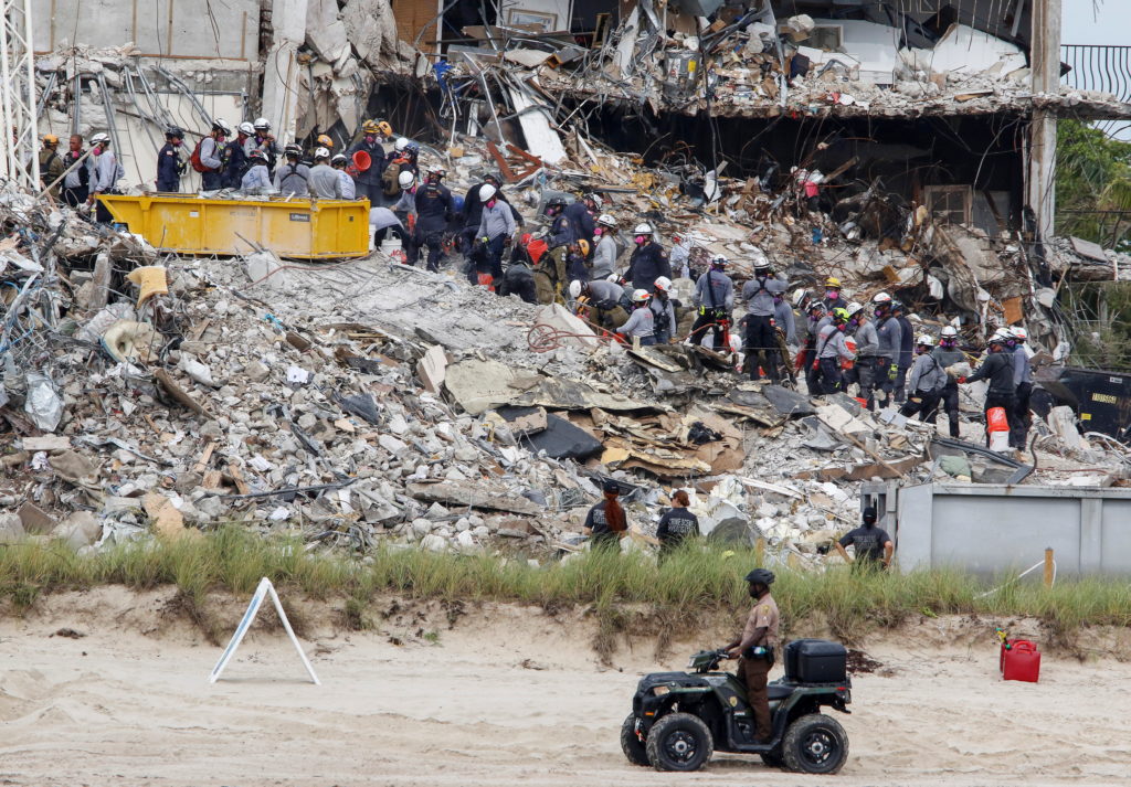 Rescue workers make slow progress at Florida building collapse | The ...