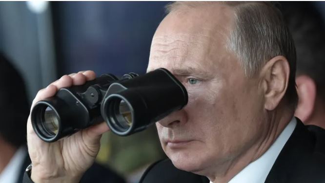 Putin Using Binoculars