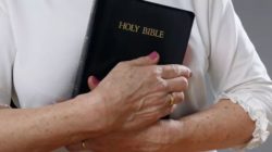 Holding-bible
