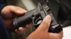 holding-hand-gun